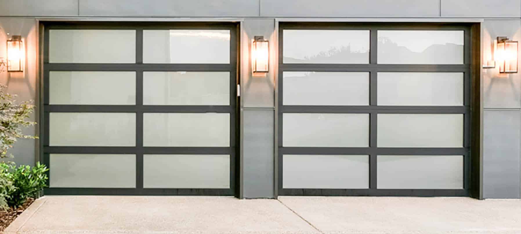man fixing commercial garage door broken spring.