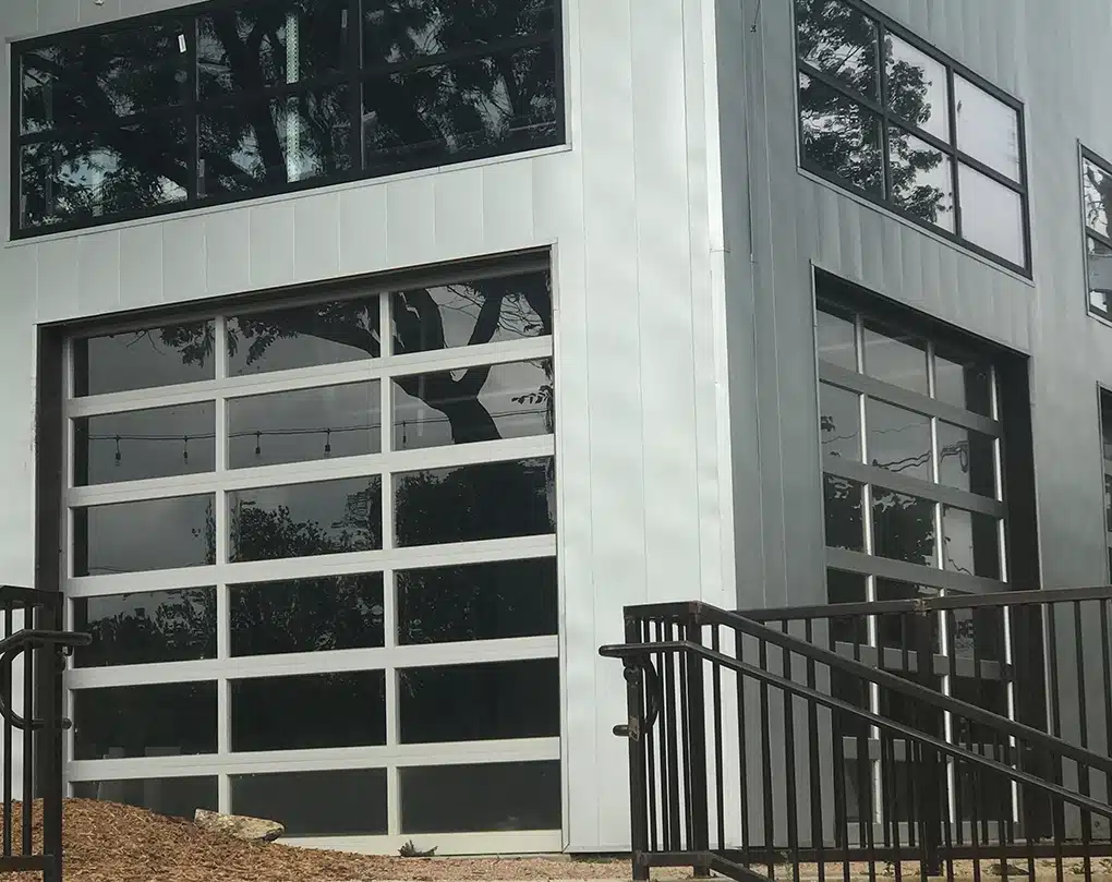 Commercial building showing overhead garage doors.
