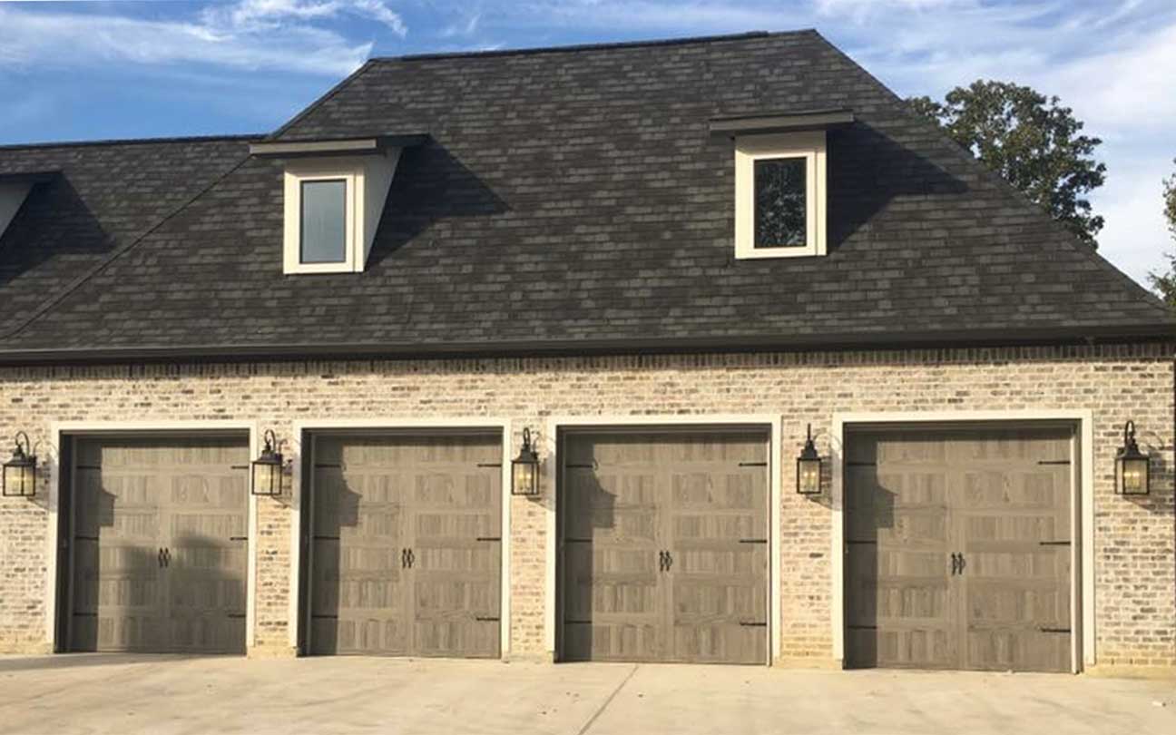 Set of 4 new garage doors installed by Garage Door Rescue LLC