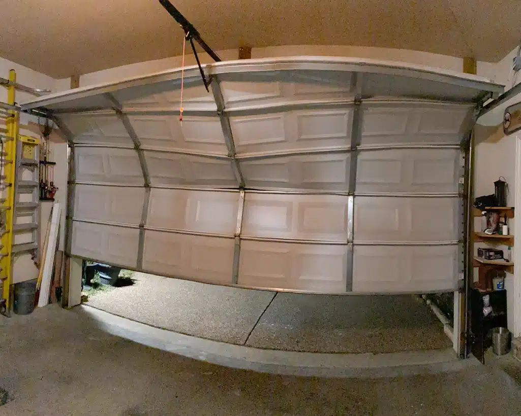 Bent garage door-residential
