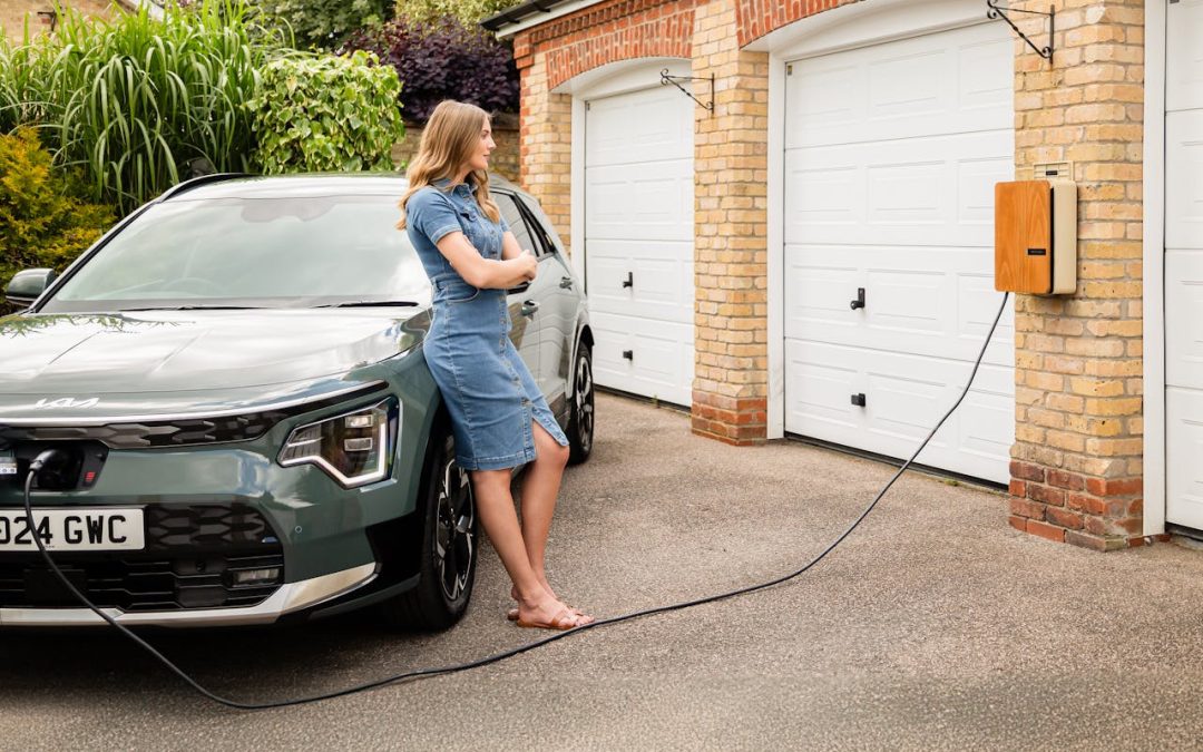 woman with car outside garage